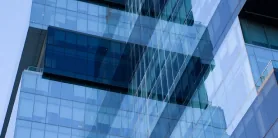 Curtain-wall glazing reflecting a neighbouring facade